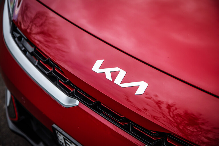 Which Car Car Reviews 2022 Kia Cerato GT Red Hatch Bonnet Badge